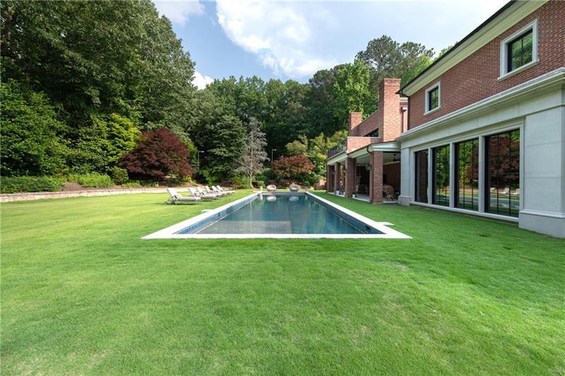 4615 Northside Drive Northwest Atlanta, GA 30327 - Photo 37 of 69 a view of a house with a backyard
