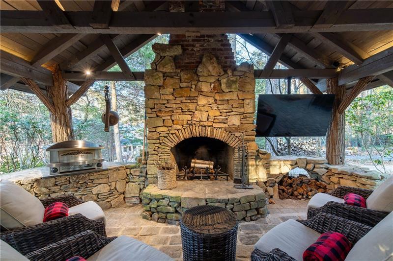 4615 Northside Drive Northwest Atlanta, GA 30327 - Photo 50 of 69 a living room with furniture and a fireplace