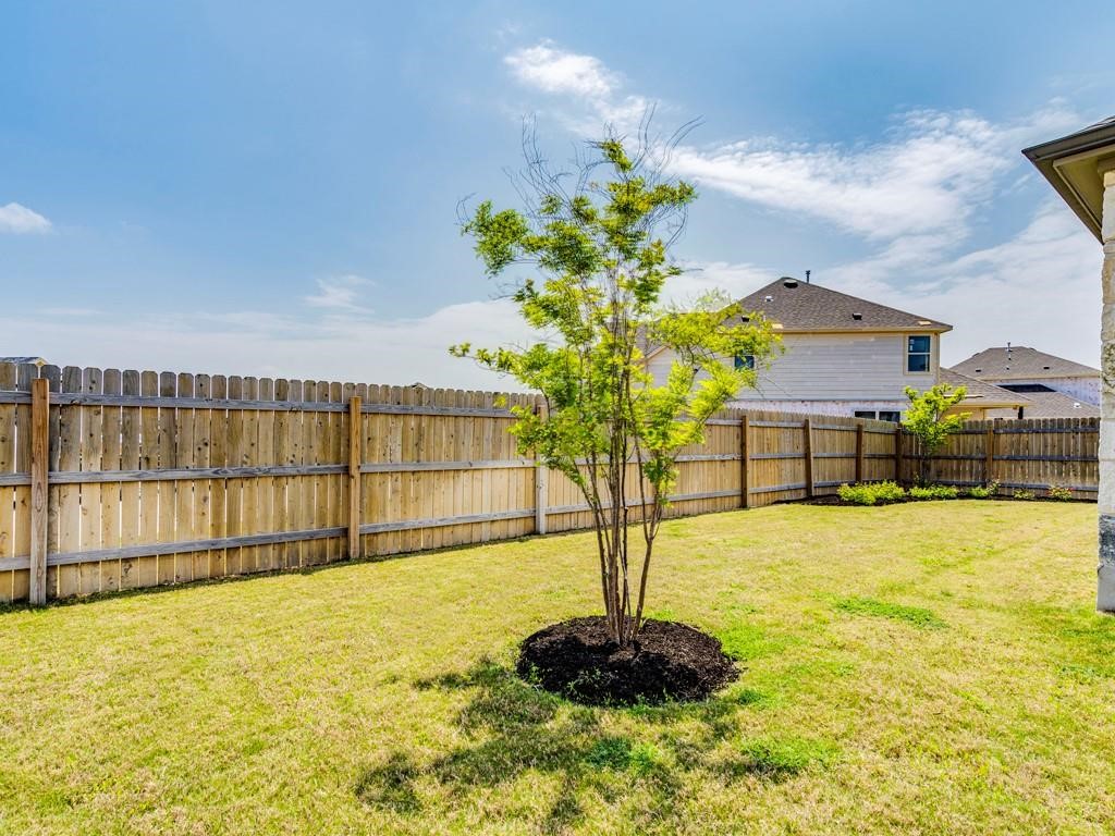 4210 Birdwatch Loop, Unit 2 Pflugerville, TX 78660 - Photo 29 of 31 A fully enclosed yard offers private outdoor enjoyment.