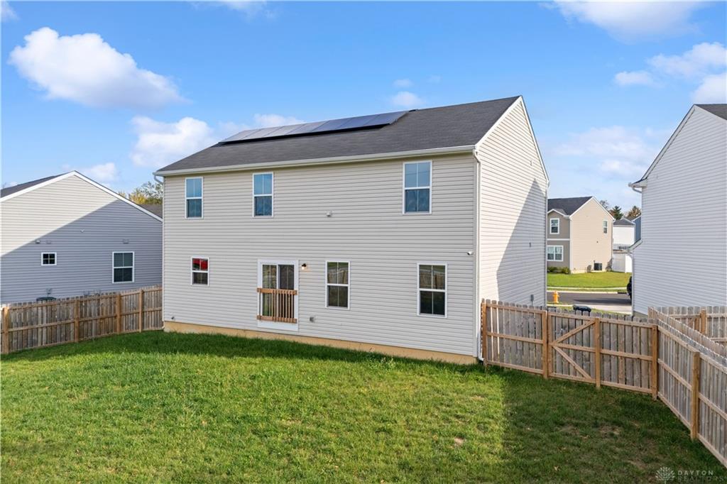166 Chesapeake Circle Springfield, OH 45505 - Photo 14 of 15 This home offers a generous yard and modern solar panels for energy efficiency.
