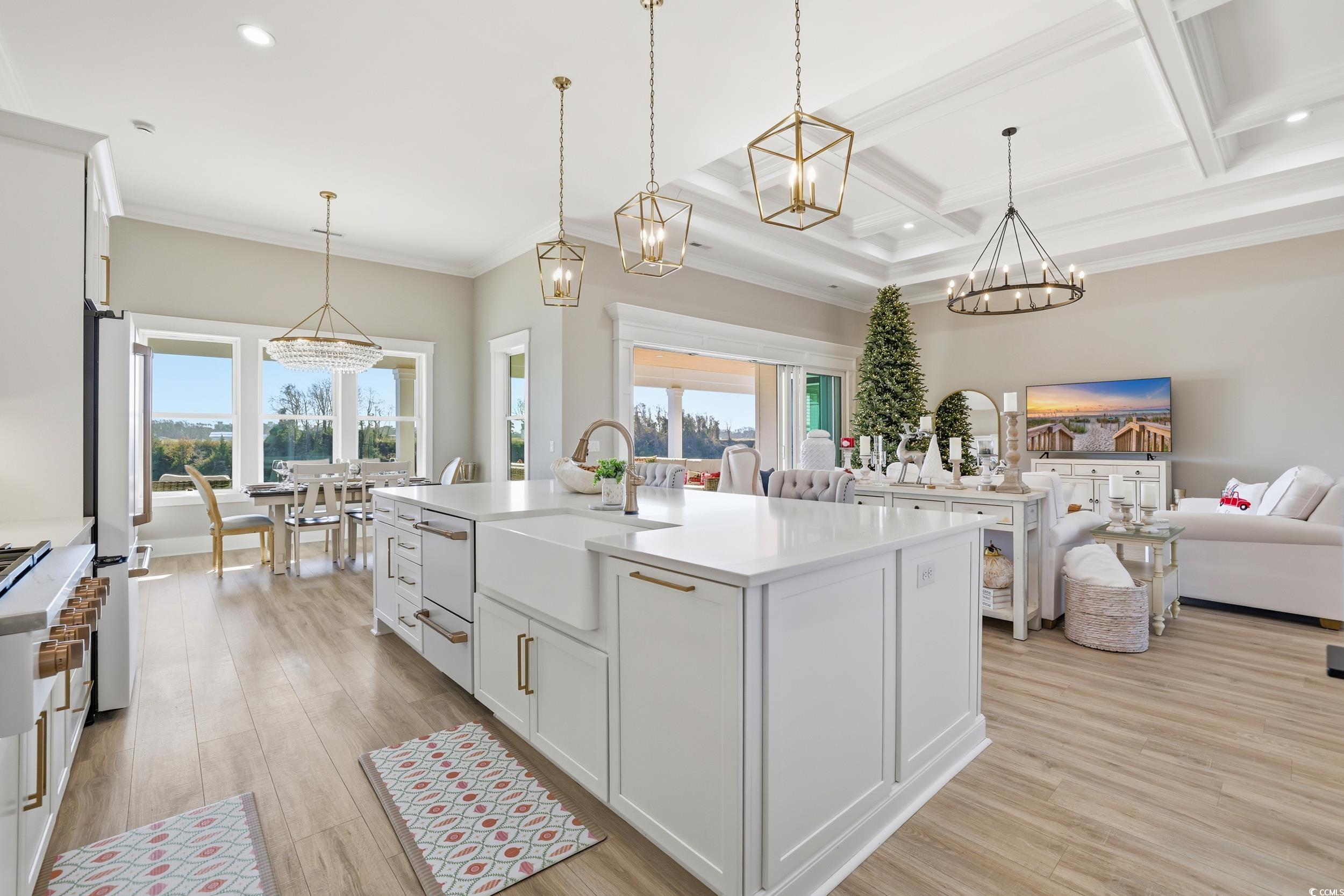 280 Bay Rdg Drive North Myrtle Beach, SC 29582 - Photo 11 of 38 Kitchen with white cabinetry, a chandelier, decorative light fixtures, coffered ceiling, and recessed lighting