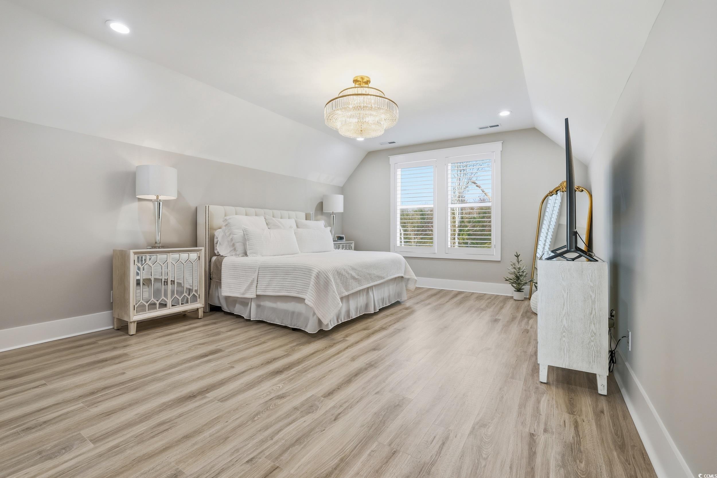 280 Bay Rdg Drive North Myrtle Beach, SC 29582 - Photo 22 of 38 Bedroom with lofted ceiling, light wood-type flooring, recessed lighting, and a chandelier