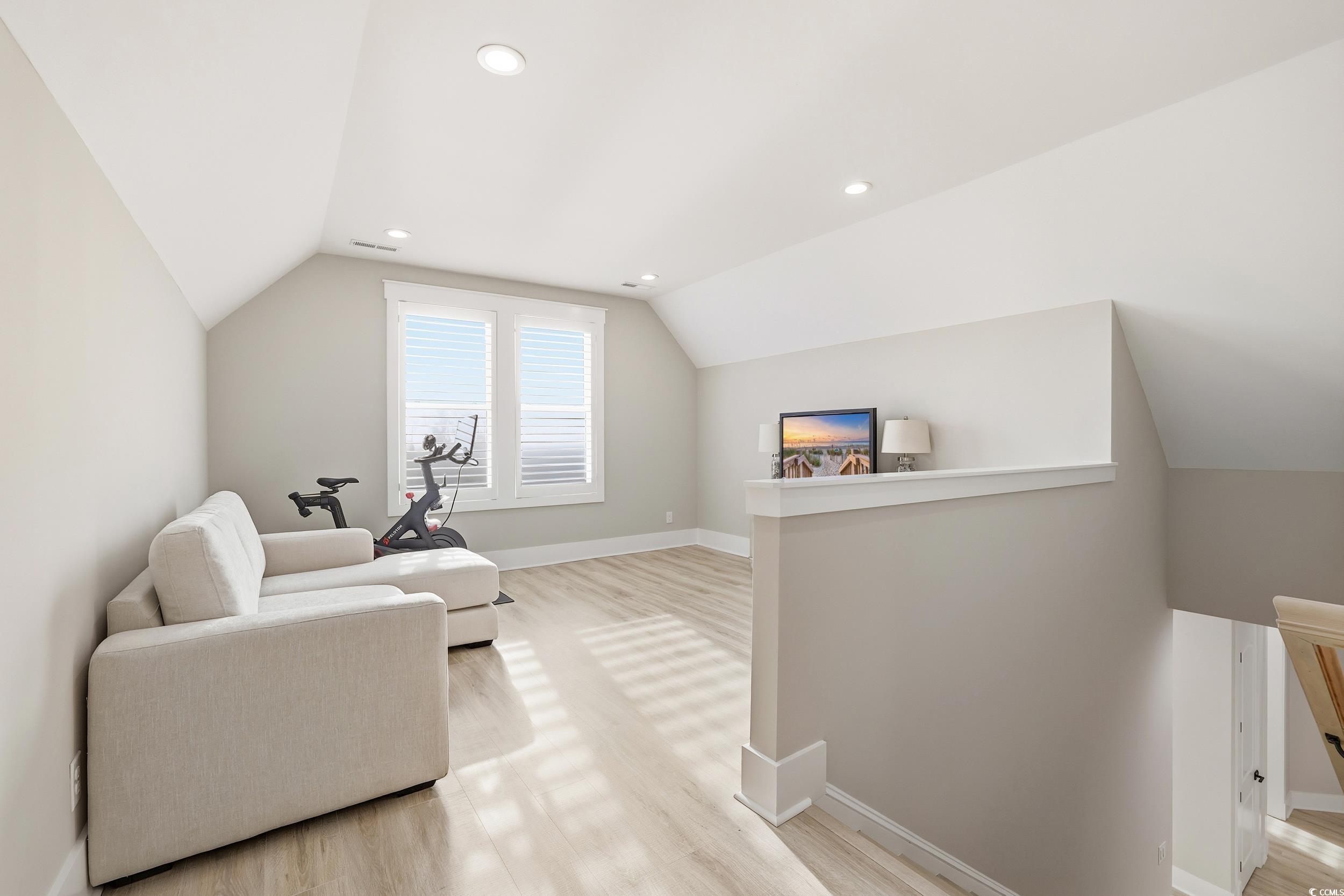 280 Bay Rdg Drive North Myrtle Beach, SC 29582 - Photo 24 of 38 Living area featuring lofted ceiling, light wood-type flooring, and recessed lighting