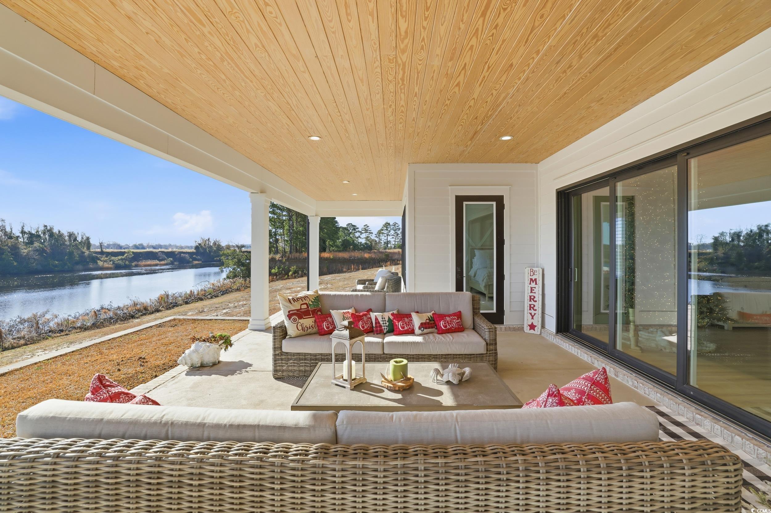 280 Bay Rdg Drive North Myrtle Beach, SC 29582 - Photo 30 of 38 View of patio / terrace featuring a water view and outdoor lounge area
