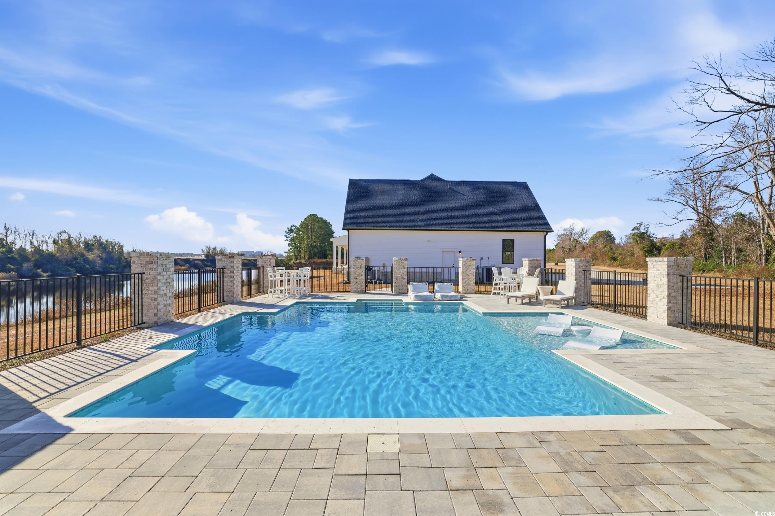 280 Bay Rdg Drive North Myrtle Beach, SC 29582 - Photo 31 of 38 View of pool featuring a fenced backyard and a patio area