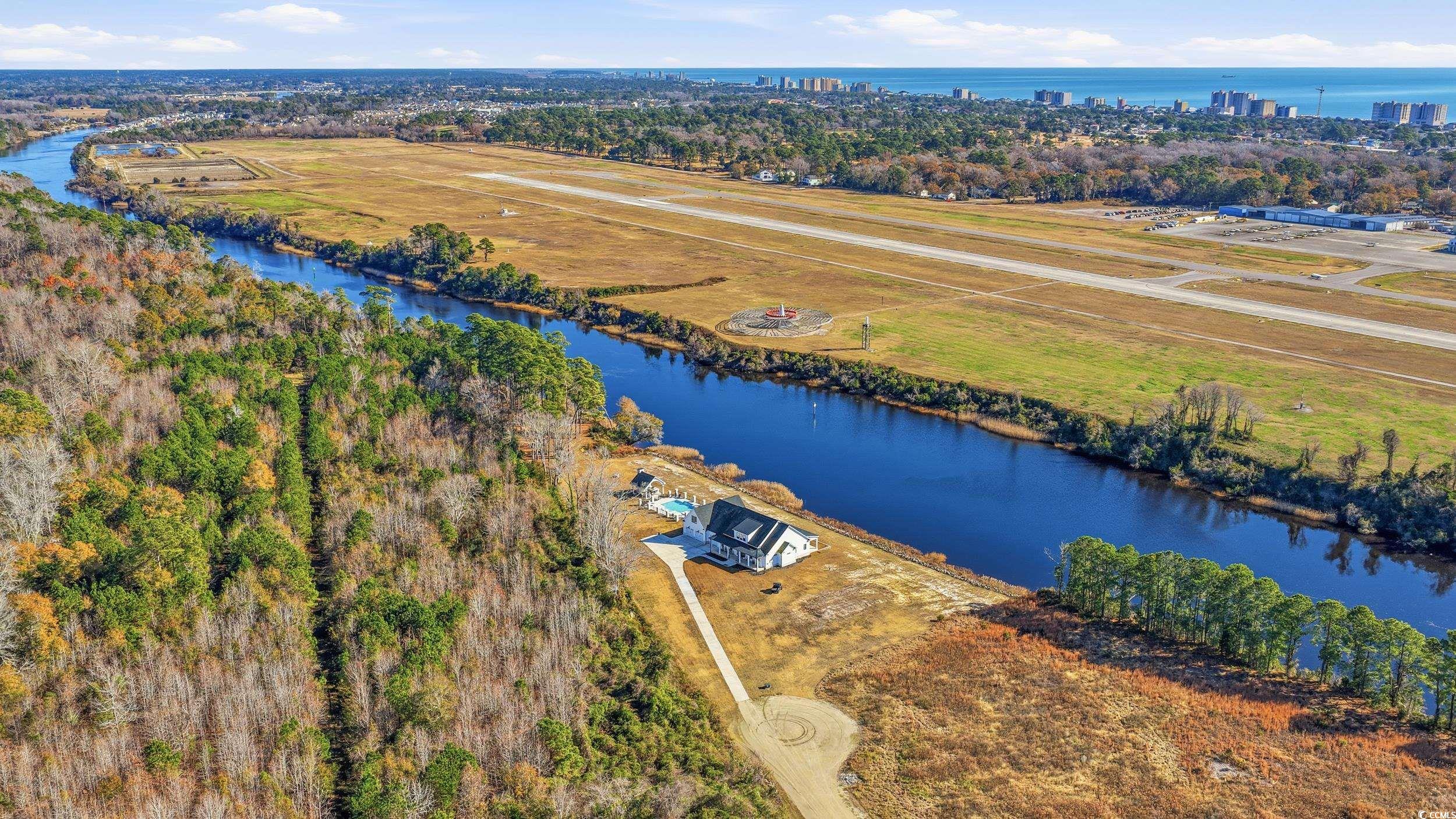 280 Bay Rdg Drive North Myrtle Beach, SC 29582 - Photo 4 of 38 Aerial view of a nearby body of water