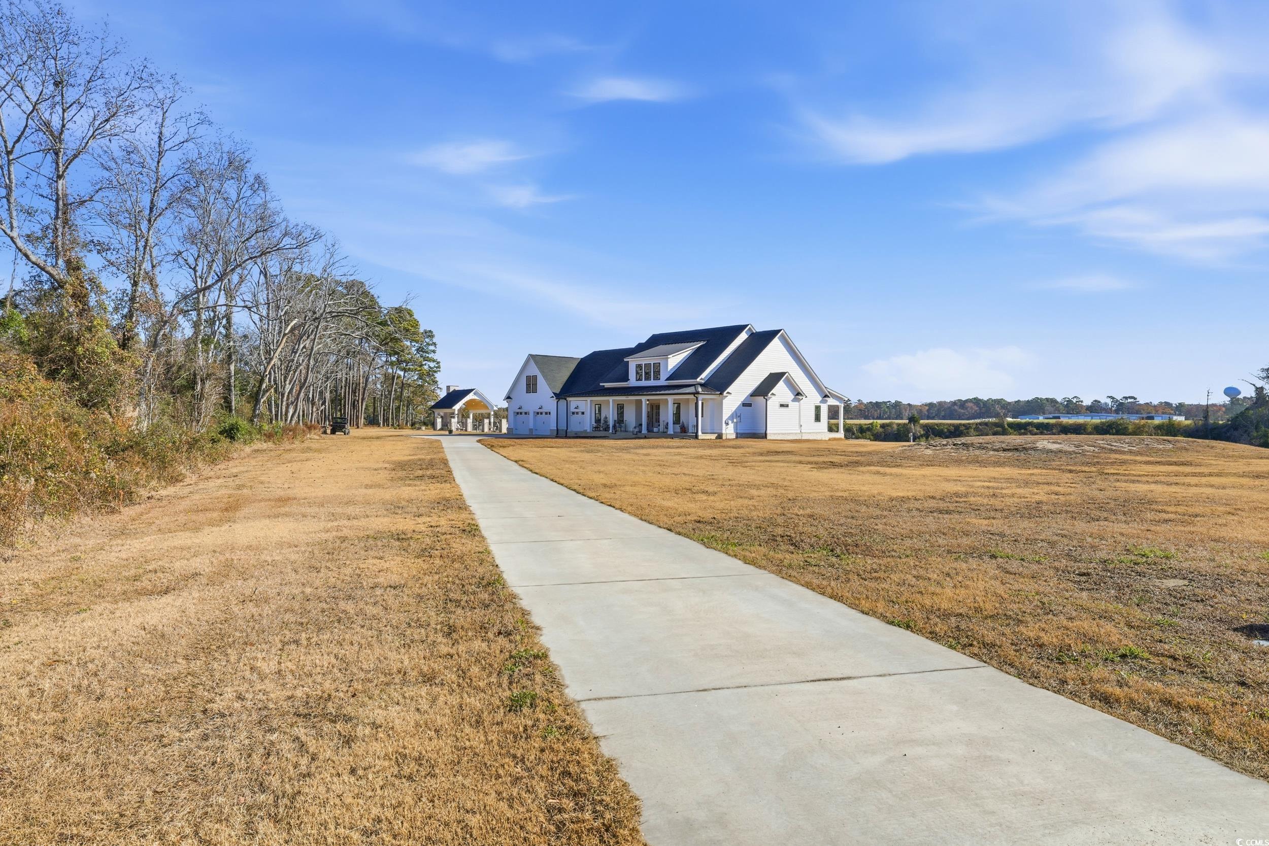 280 Bay Rdg Drive North Myrtle Beach, SC 29582 - Photo 9 of 38 Modern farmhouse style home featuring a front lawn