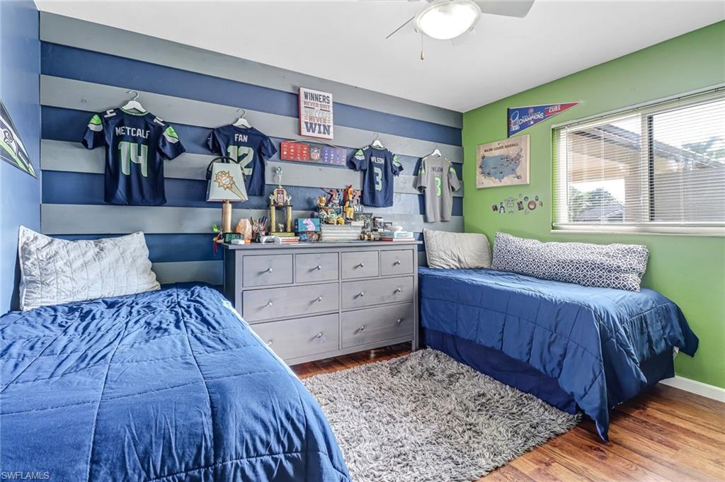 4576 Eagle Key Circle Naples, FL 34112 - Photo 12 of 18 a bedroom with a bed and window