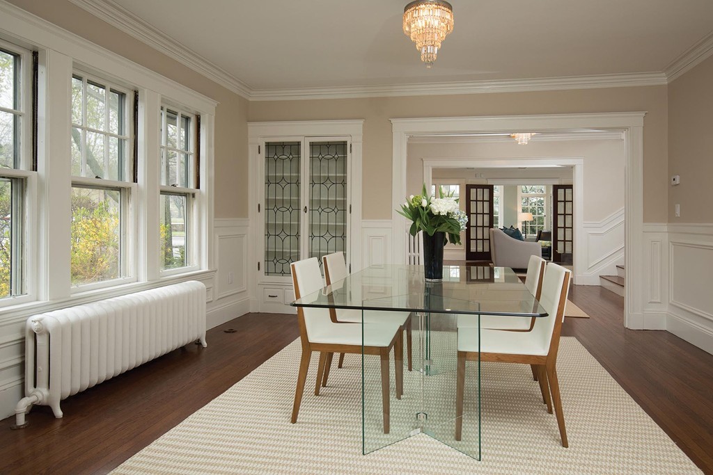 131 Dunster Road Boston, MA 02130 - Photo 4 of 13 a view of a dining room with furniture wooden floor and chandelier