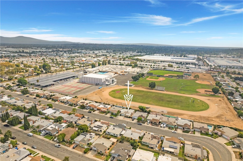1936 Skywood Street Brea, CA 92821 - Photo 31 of 32 a view of a swimming pool with an ocean view
