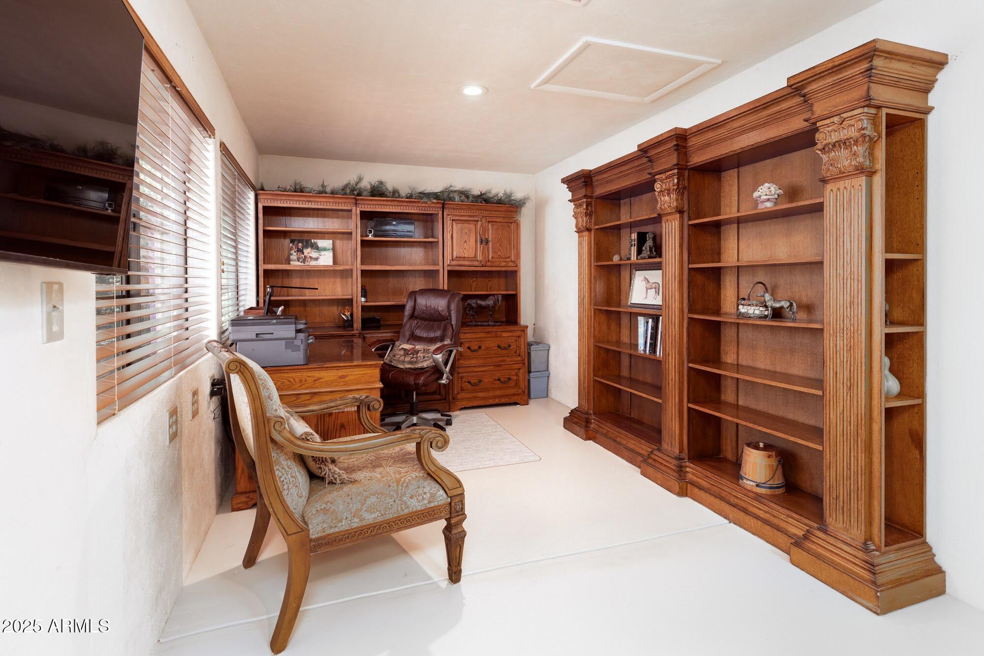 712 West Treasure Road Pearce, AZ 85625 - Photo 11 of 38 a view of a workspace with furniture