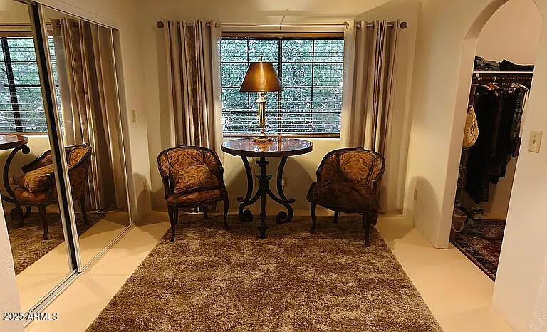 712 West Treasure Road Pearce, AZ 85625 - Photo 26 of 38 a living room with furniture and a window