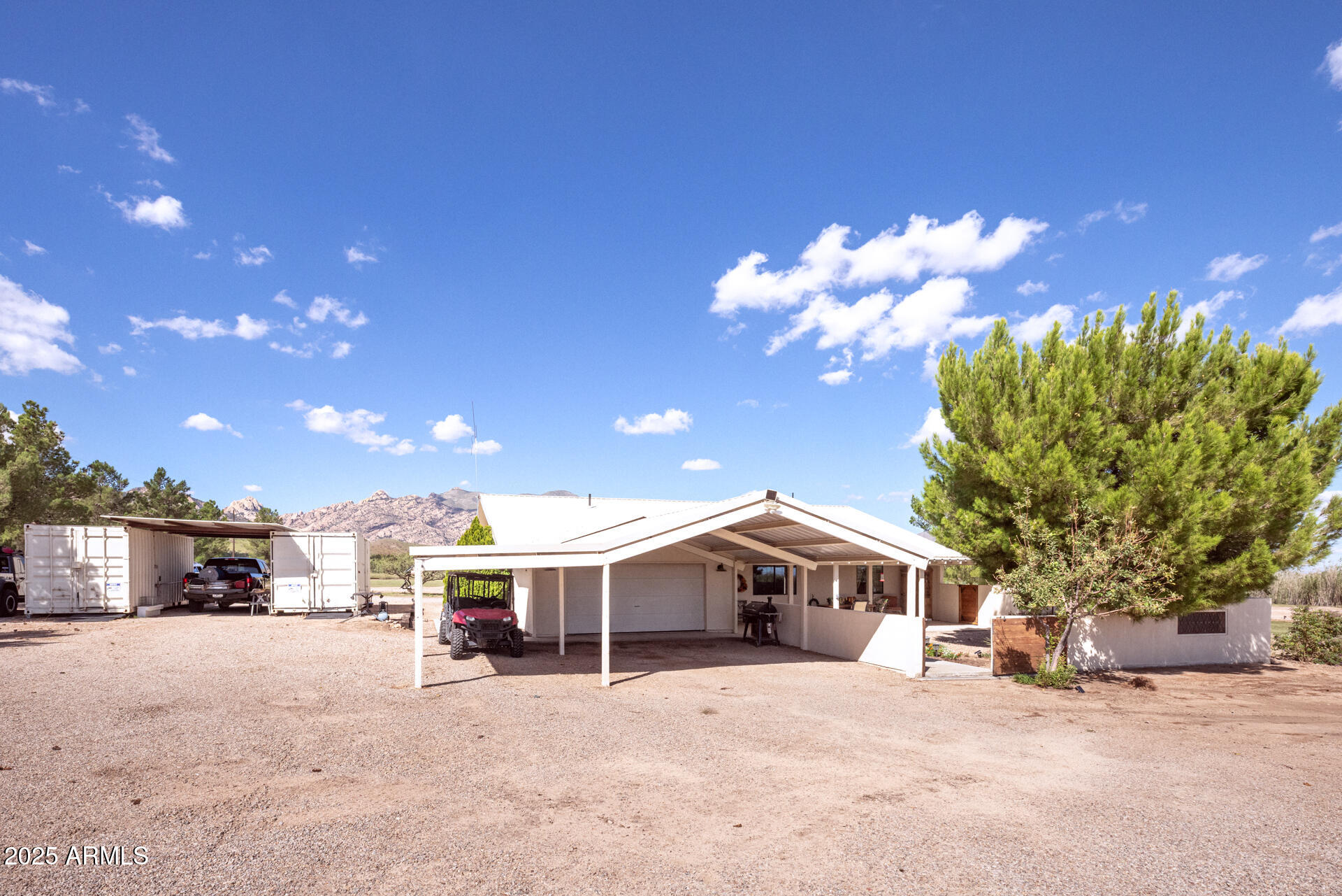 712 West Treasure Road Pearce, AZ 85625 - Photo 9 of 38 a view of a house with a yard