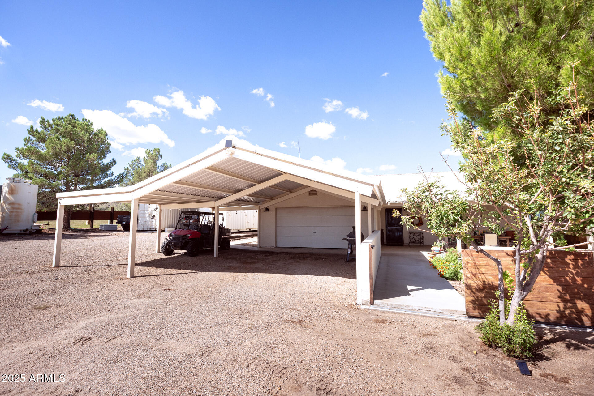 712 West Treasure Road Pearce, AZ 85625 - Photo 10 of 38 a view of a house with a backyard