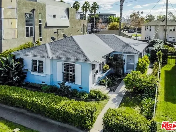 a aerial view of a house with lots of garden