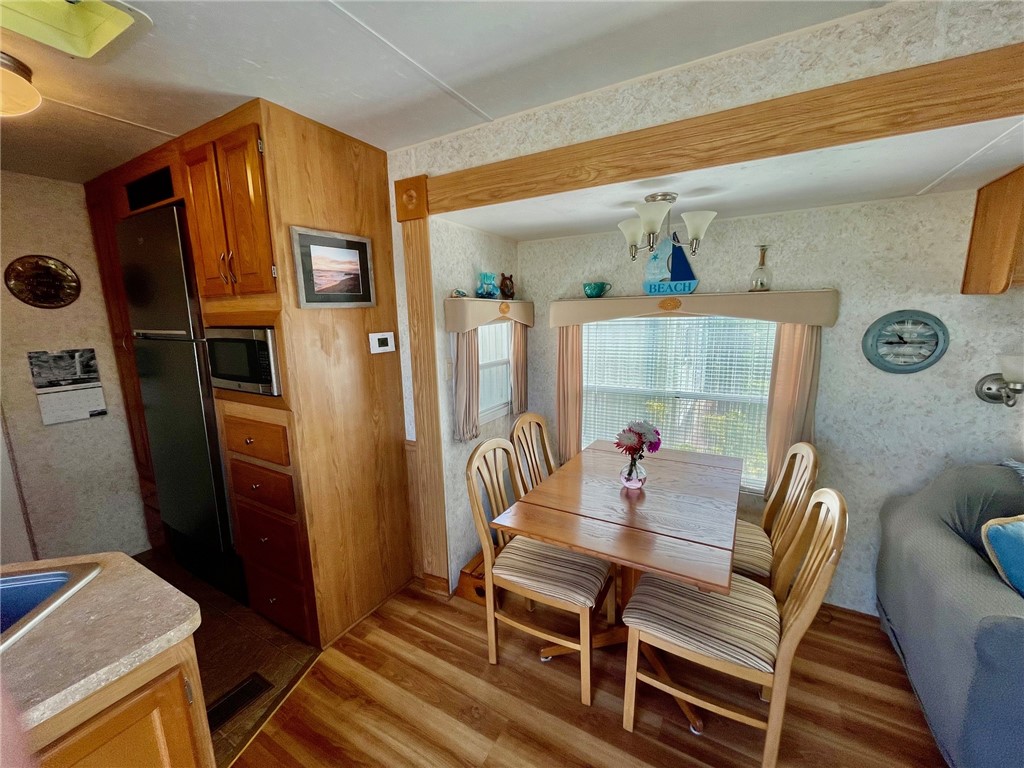 5288 Inlet Way Hutchinson Island, FL 34949 - Photo 13 of 21 a dining room with furniture and window