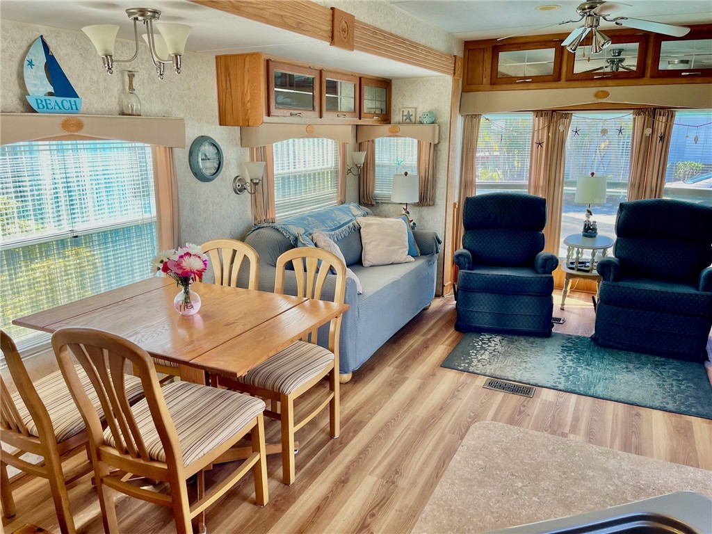 5288 Inlet Way Hutchinson Island, FL 34949 - Photo 16 of 21 a view of a livingroom with furniture window and wooden floor