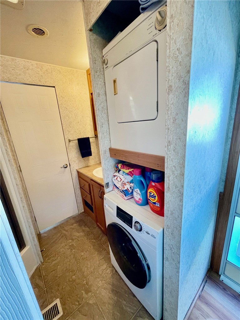 5288 Inlet Way Hutchinson Island, FL 34949 - Photo 21 of 21 a utility room with dryer and washer