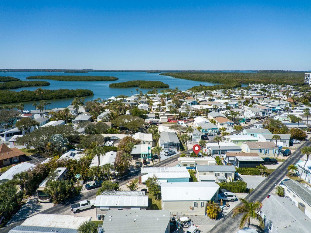 5288 Inlet Way Hutchinson Island, FL 34949 - Photo 5 of 21 an aerial view of a city with lots of residential buildings
