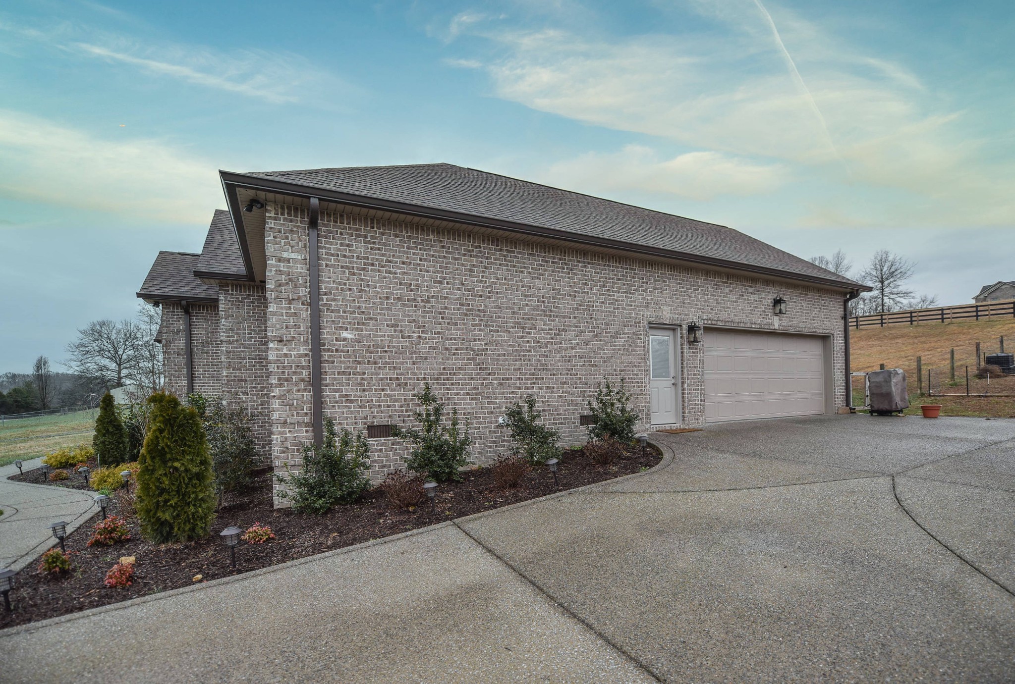 1648 Old Gallatin Road Portland, TN 37148 - Photo 2 of 25 front view of a house with potted plants