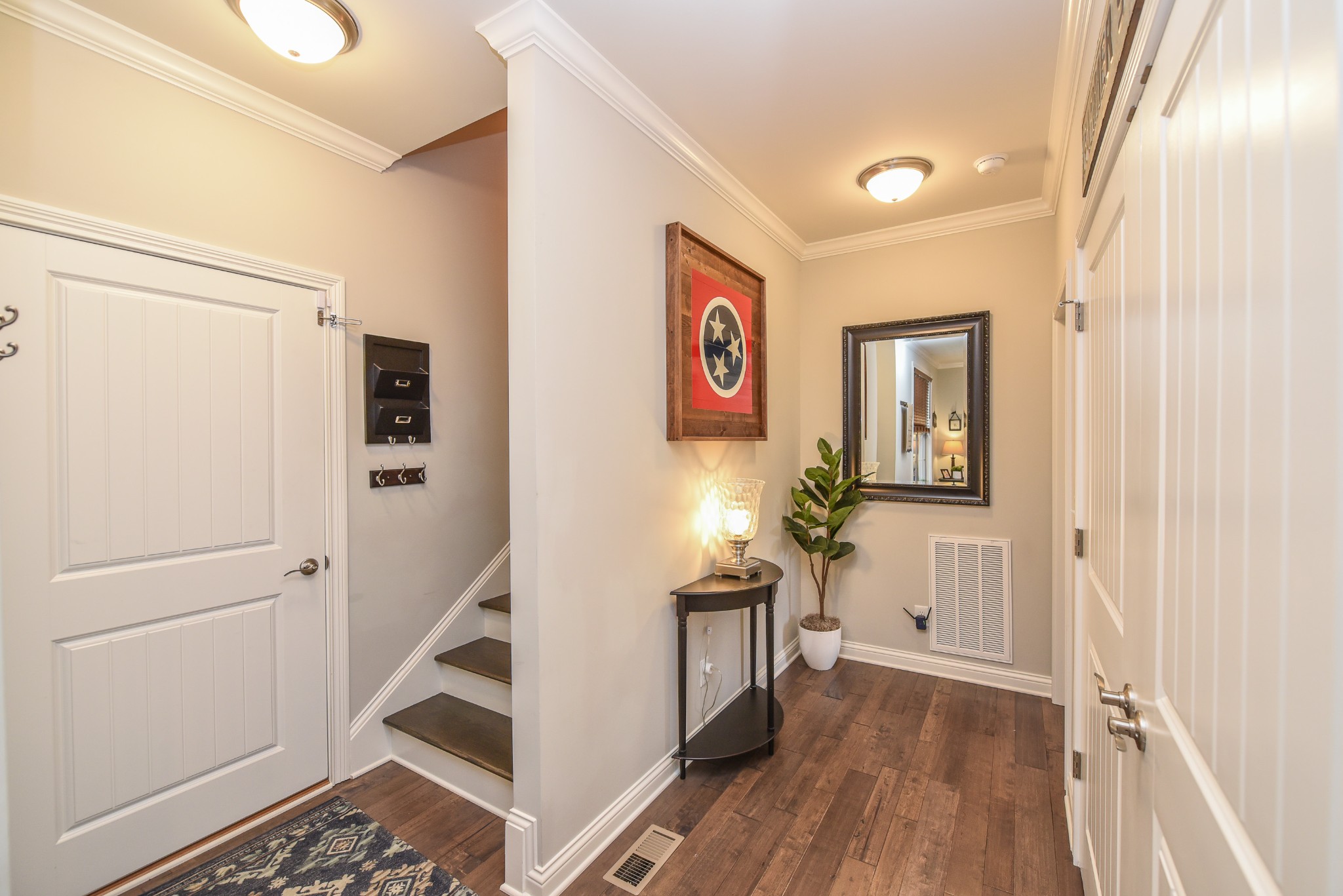1648 Old Gallatin Road Portland, TN 37148 - Photo 16 of 25 a view of hallway with stairs and wooden floor