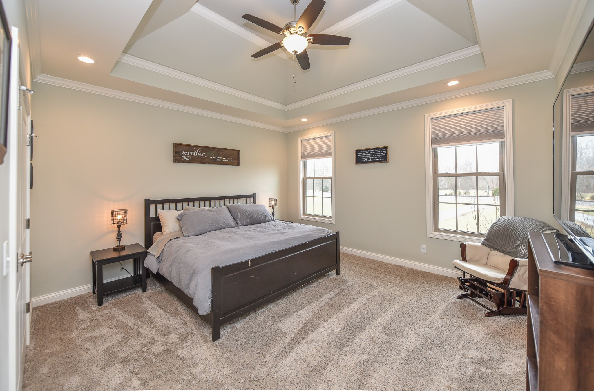 1648 Old Gallatin Road Portland, TN 37148 - Photo 18 of 25 a spacious bedroom with a bed and a chair