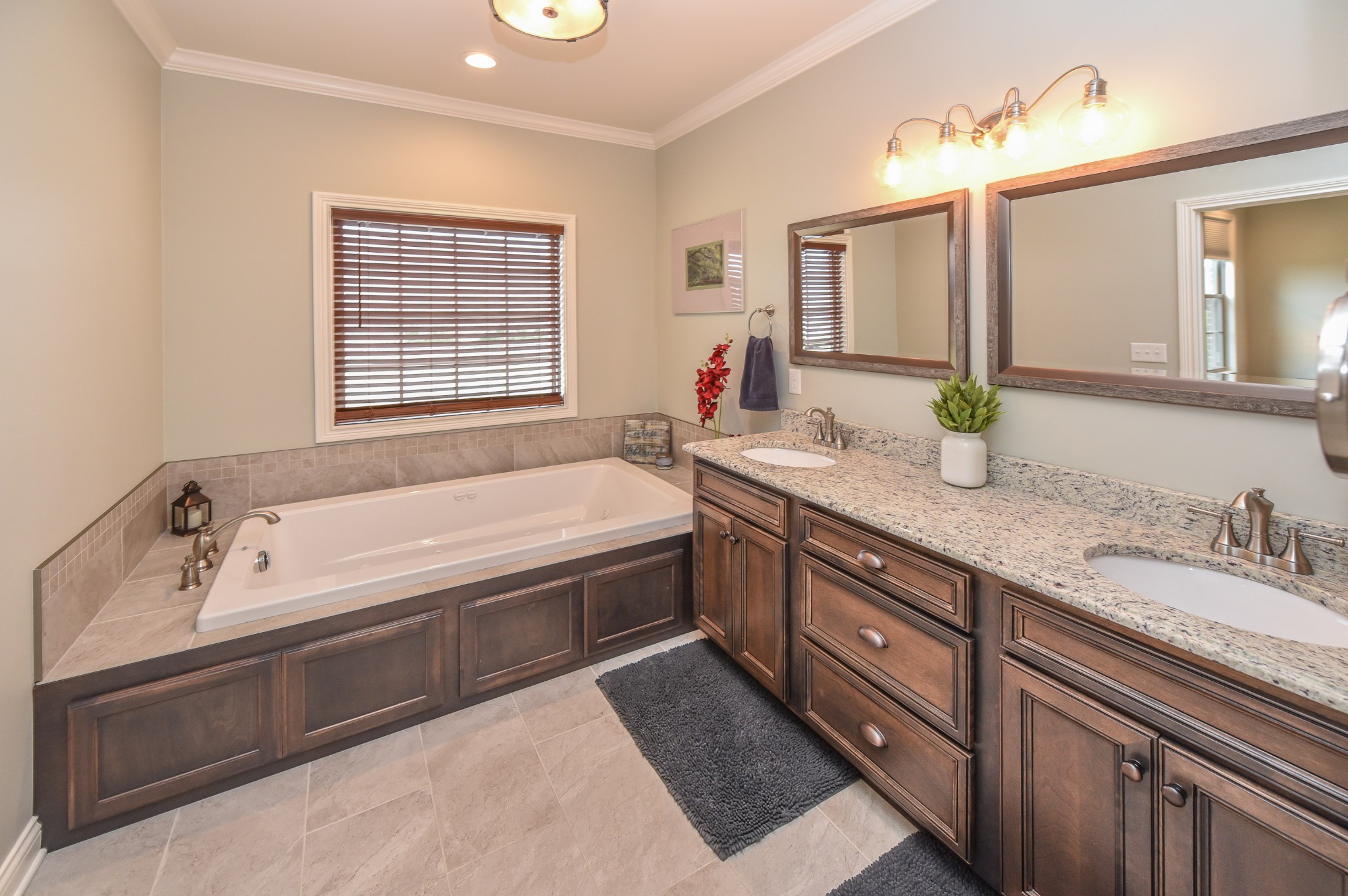 1648 Old Gallatin Road Portland, TN 37148 - Photo 19 of 25 a spacious bathroom with a tub double sink window and mirror