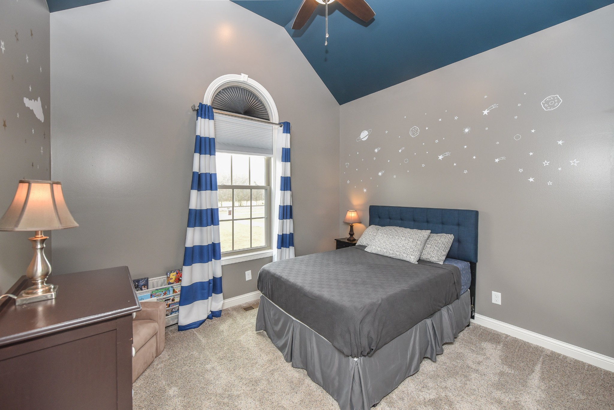 1648 Old Gallatin Road Portland, TN 37148 - Photo 21 of 25 a bedroom with a bed and a window