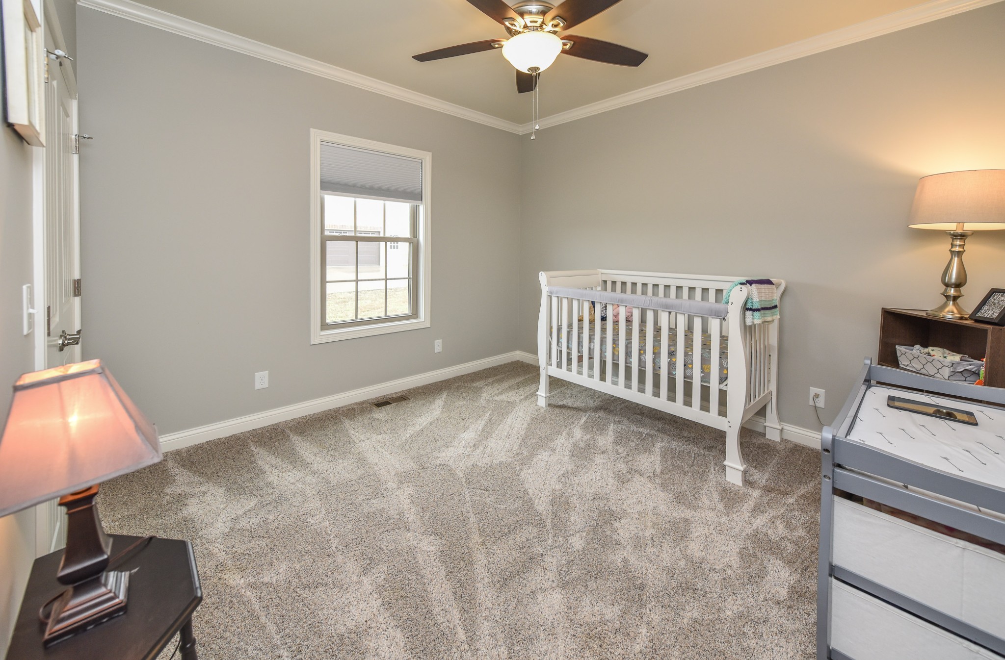 1648 Old Gallatin Road Portland, TN 37148 - Photo 23 of 25 a view of a livingroom with a ceiling fan and a window