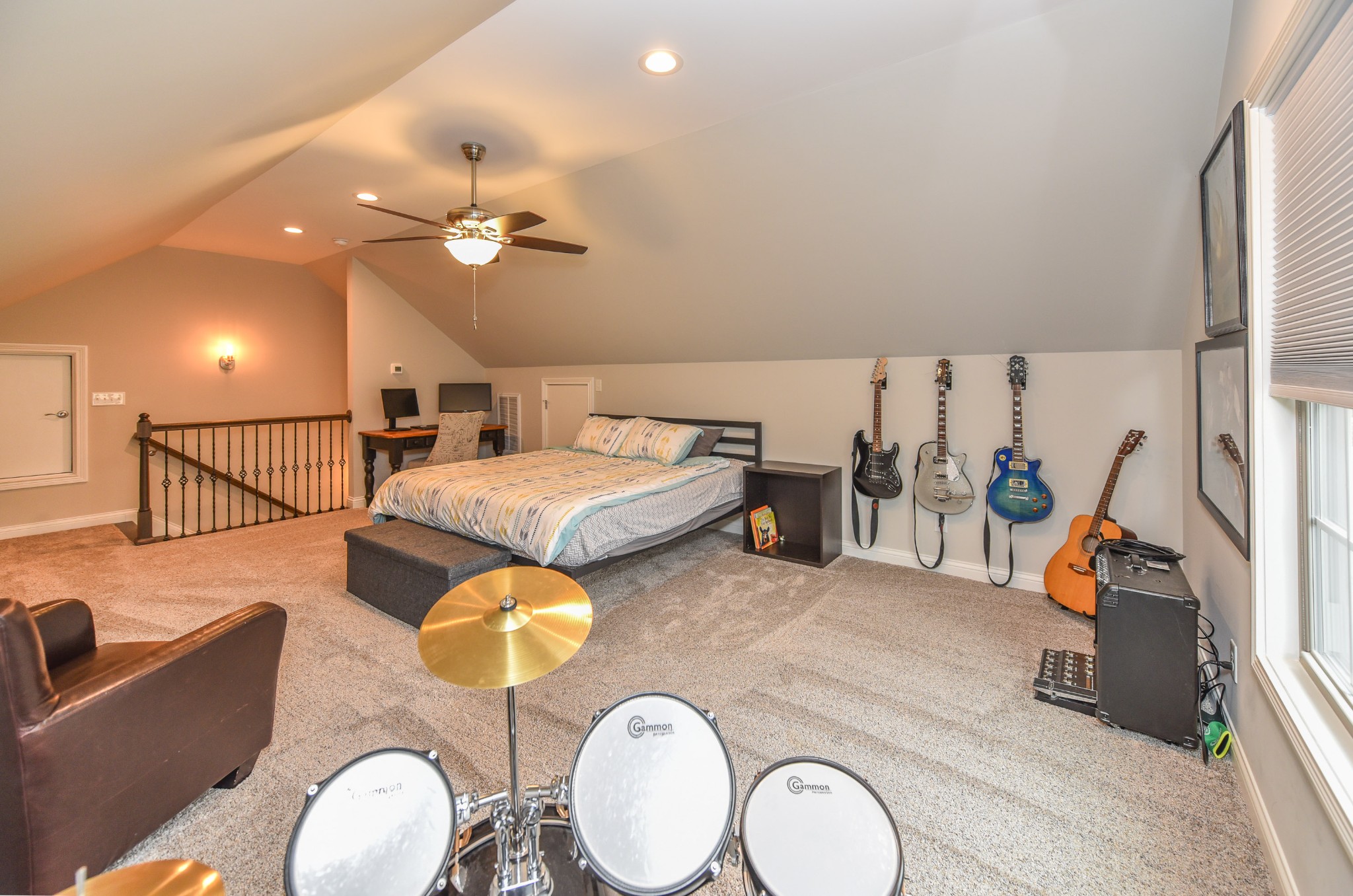 1648 Old Gallatin Road Portland, TN 37148 - Photo 25 of 25 a living room with furniture a chandelier and a flat screen tv