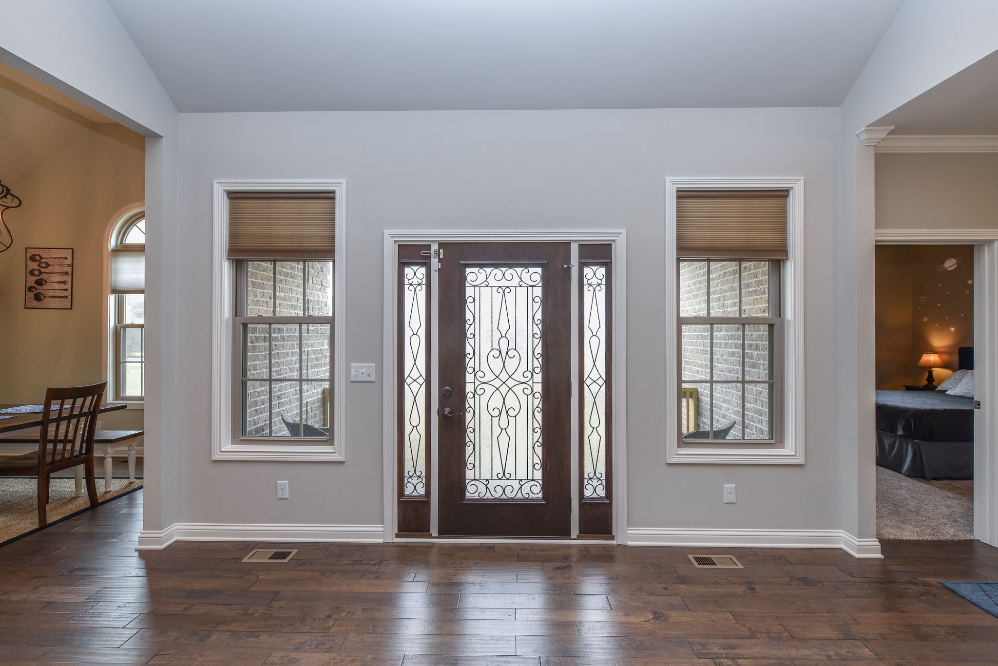 1648 Old Gallatin Road Portland, TN 37148 - Photo 4 of 25 a view of an empty room with wooden floor and a window