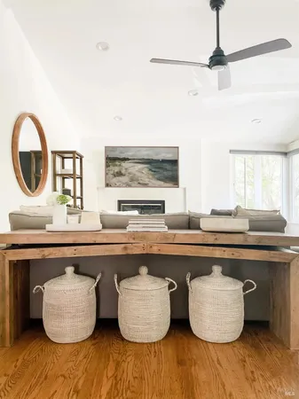 a large kitchen with a table and chairs