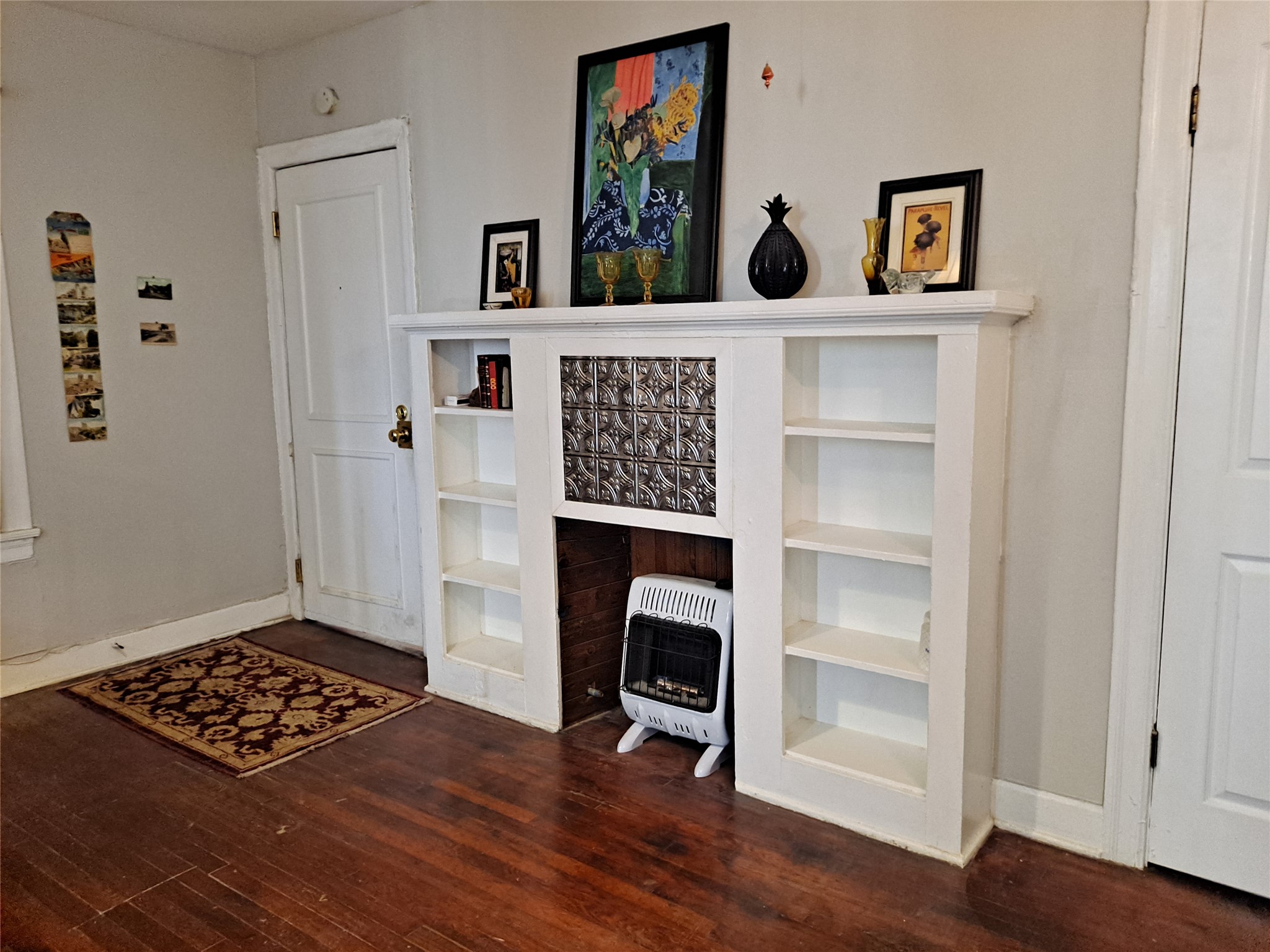 1906 San Gabriel Street, Unit 17 Austin, TX 78705 - Photo 4 of 7 a view of workspace with wooden floor closet and window