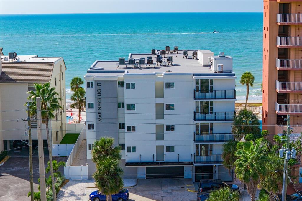 16332 Gulf Boulevard, Unit 3B Redington Beach, FL 33708 - Photo 84 of 91 a view of building with outdoor space