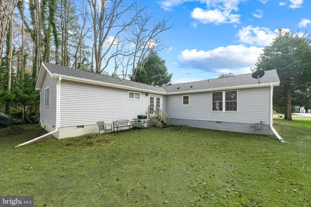 a view of a backyard with a garden