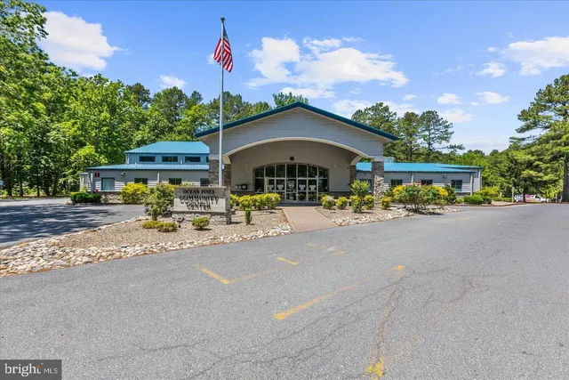 a view of a backyard with sitting area