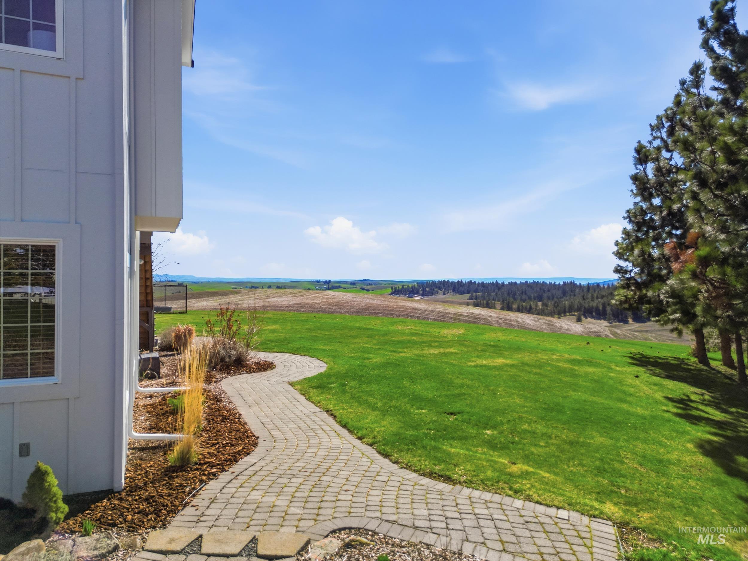 1014 Hilby Road Moscow, ID 83843 - Photo 40 of 50 View of grassy yard featuring a view of countryside