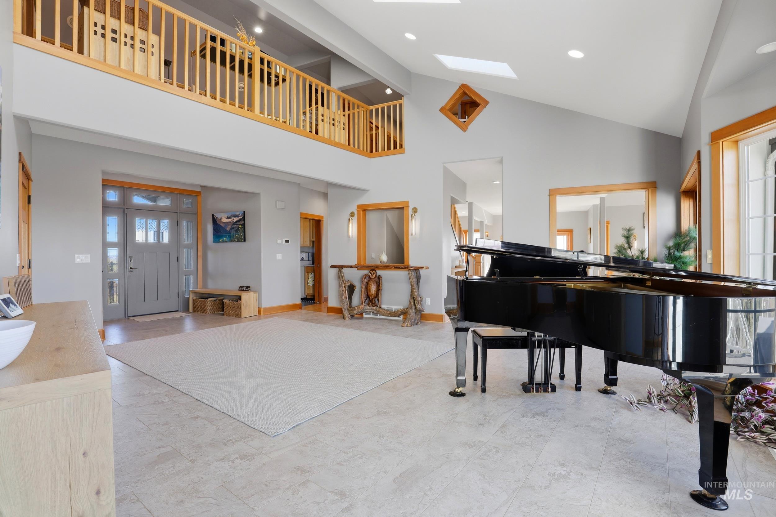 1014 Hilby Road Moscow, ID 83843 - Photo 8 of 50 Entrance foyer with plenty of natural light, vaulted ceiling, a skylight, and recessed lighting