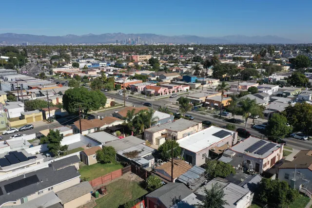 an aerial view of a city with lots of residential buildings
