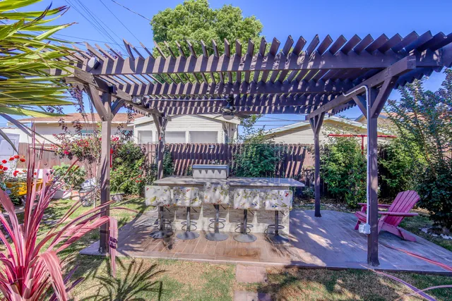 a view of a roof with sitting area