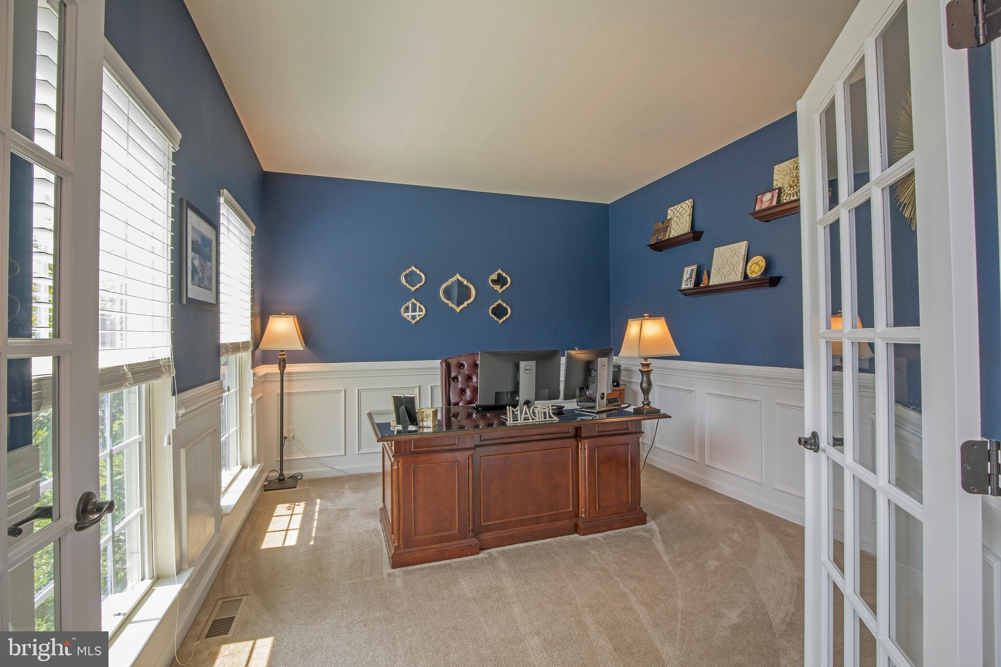 3713 Christopher Day Road Doylestown, PA 18902 - Photo 2 of 20 a view of a workspace with furniture and a window