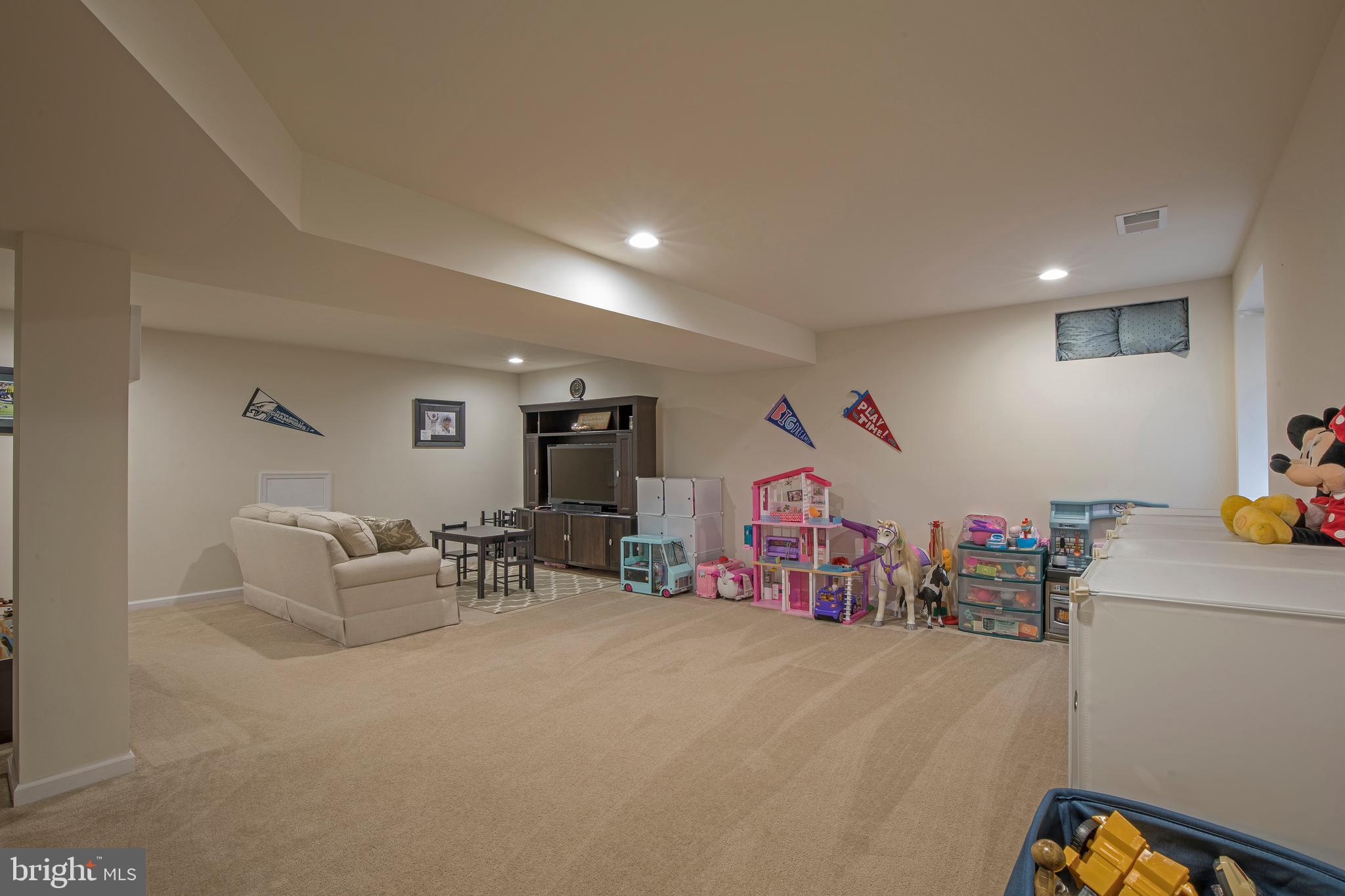 3713 Christopher Day Road Doylestown, PA 18902 - Photo 16 of 20 a living room with furniture and gym equipment