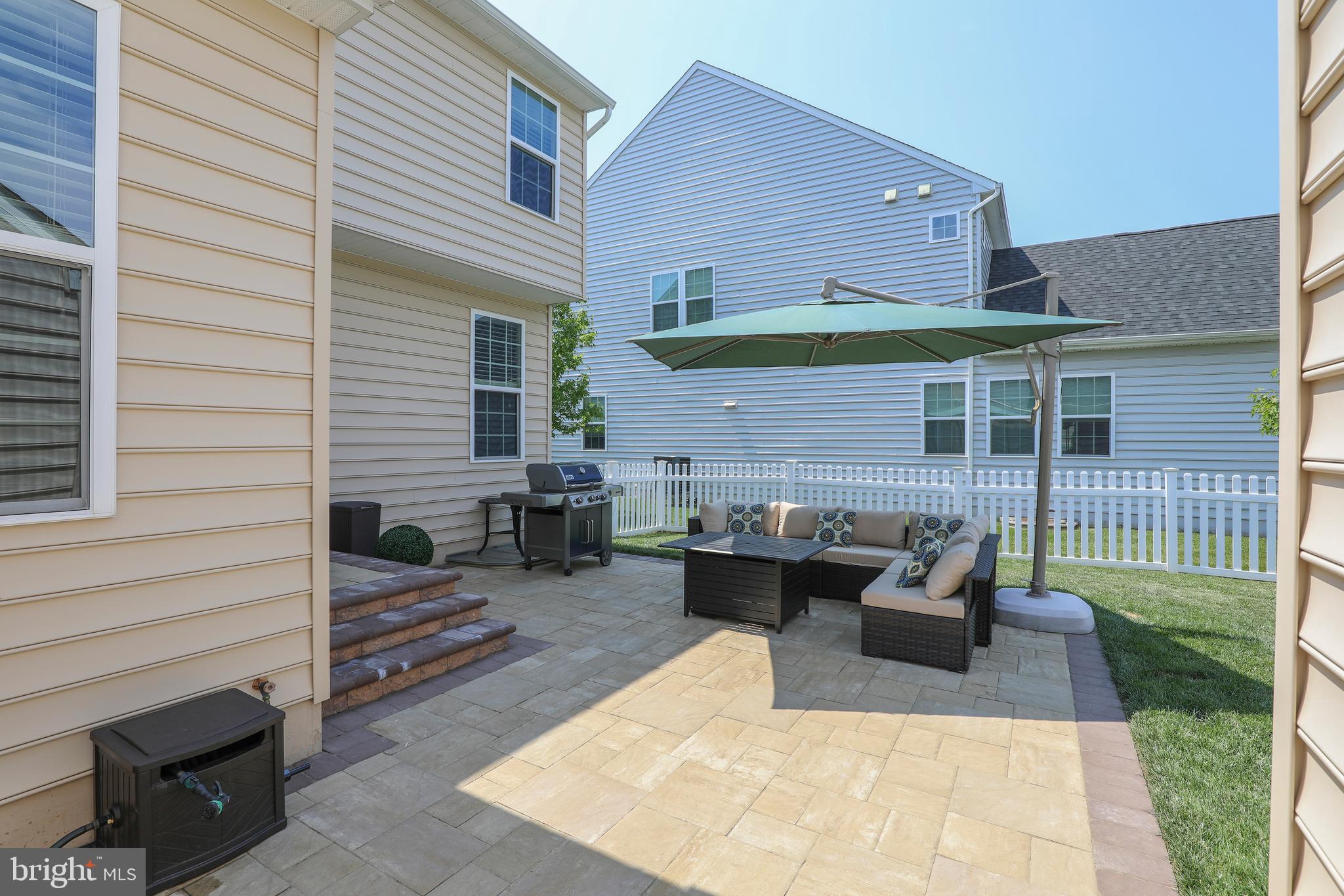 3713 Christopher Day Road Doylestown, PA 18902 - Photo 17 of 20 a view of a house with backyard and sitting area