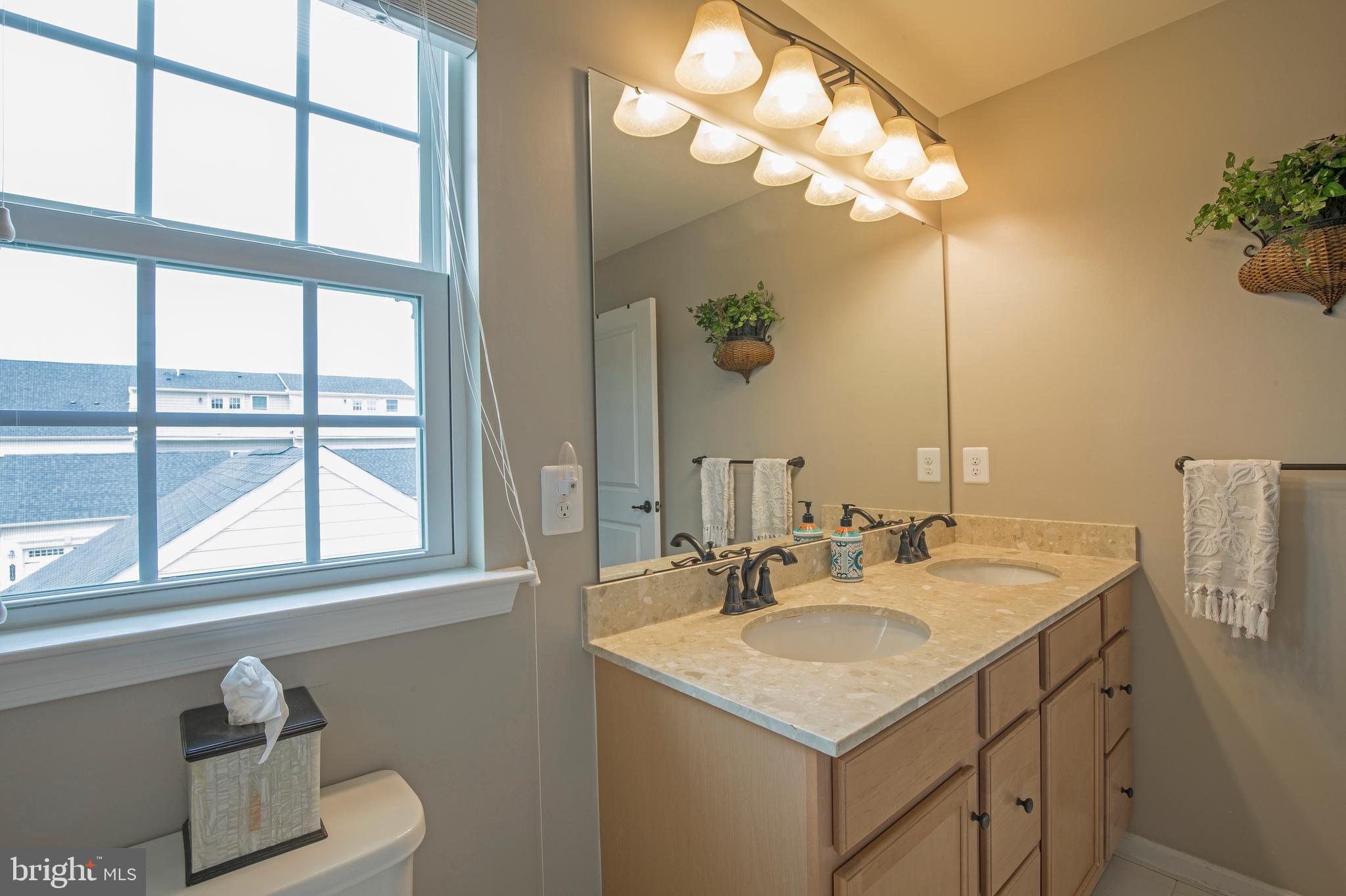 3713 Christopher Day Road Doylestown, PA 18902 - Photo 10 of 20 a bathroom with a sink and a mirror