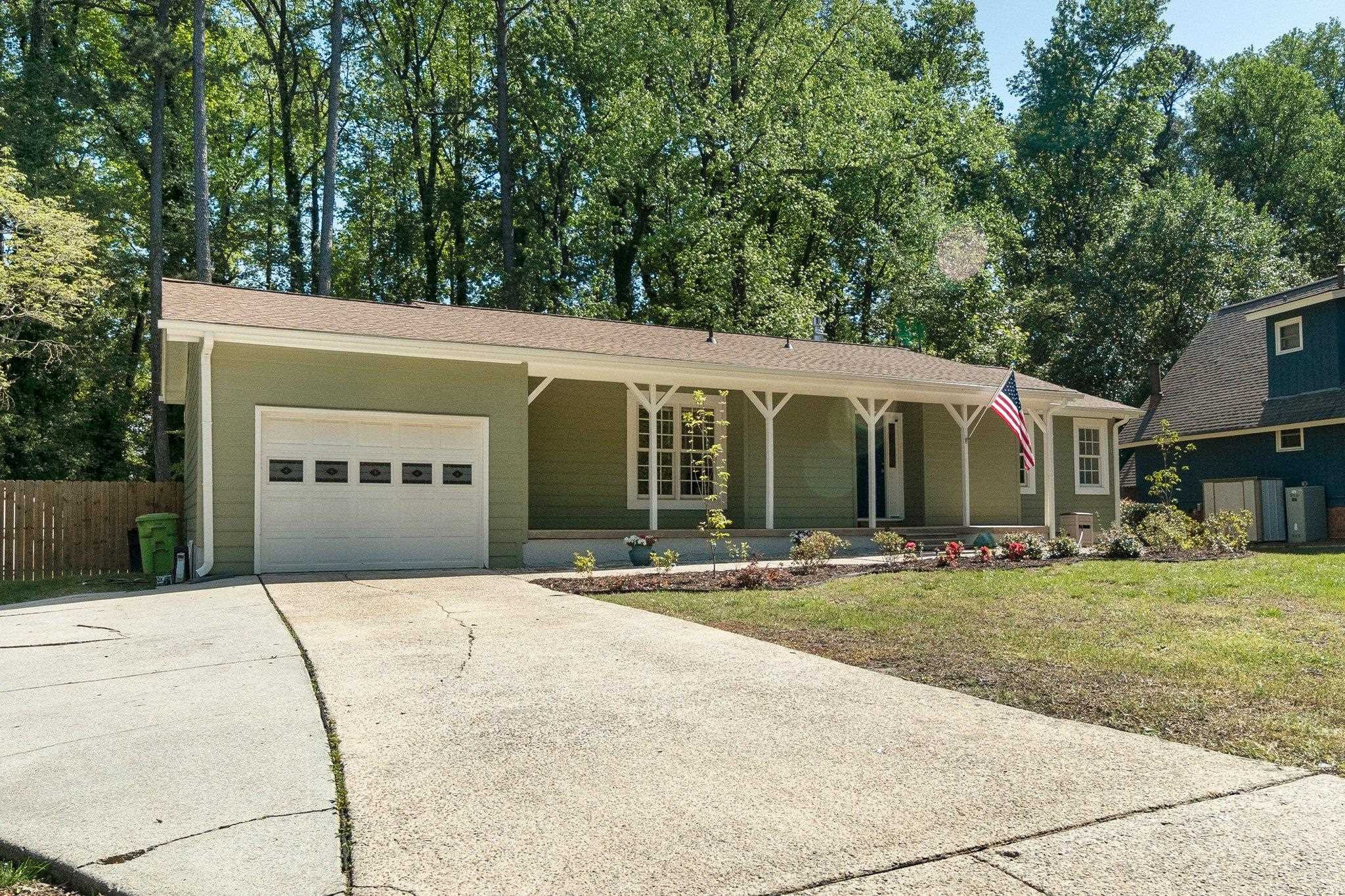 5504 Old Forge Circle Raleigh, NC 27609 - Photo 5 of 34 Wide Driveway and Oversized Attached Garage