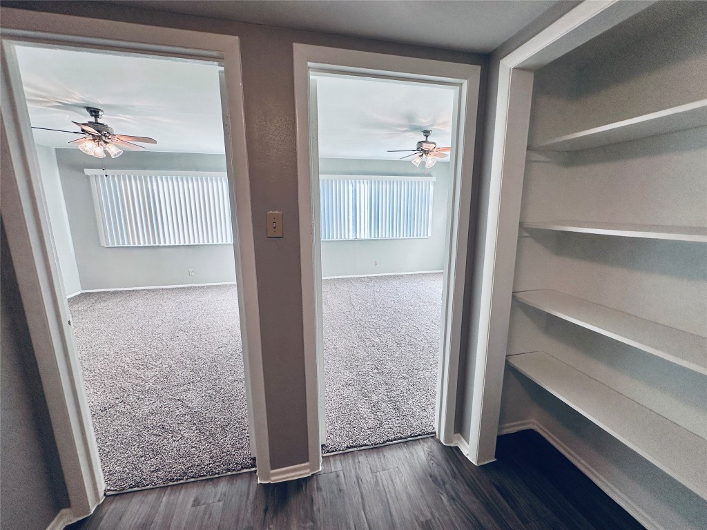601 West 11th Street, Unit 227 Austin, TX 78701 - Photo 11 of 18 a view of front door with wooden floor