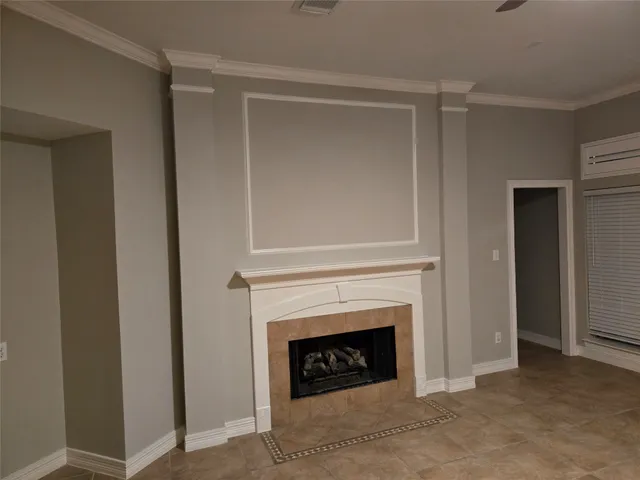 a living room with a fireplace