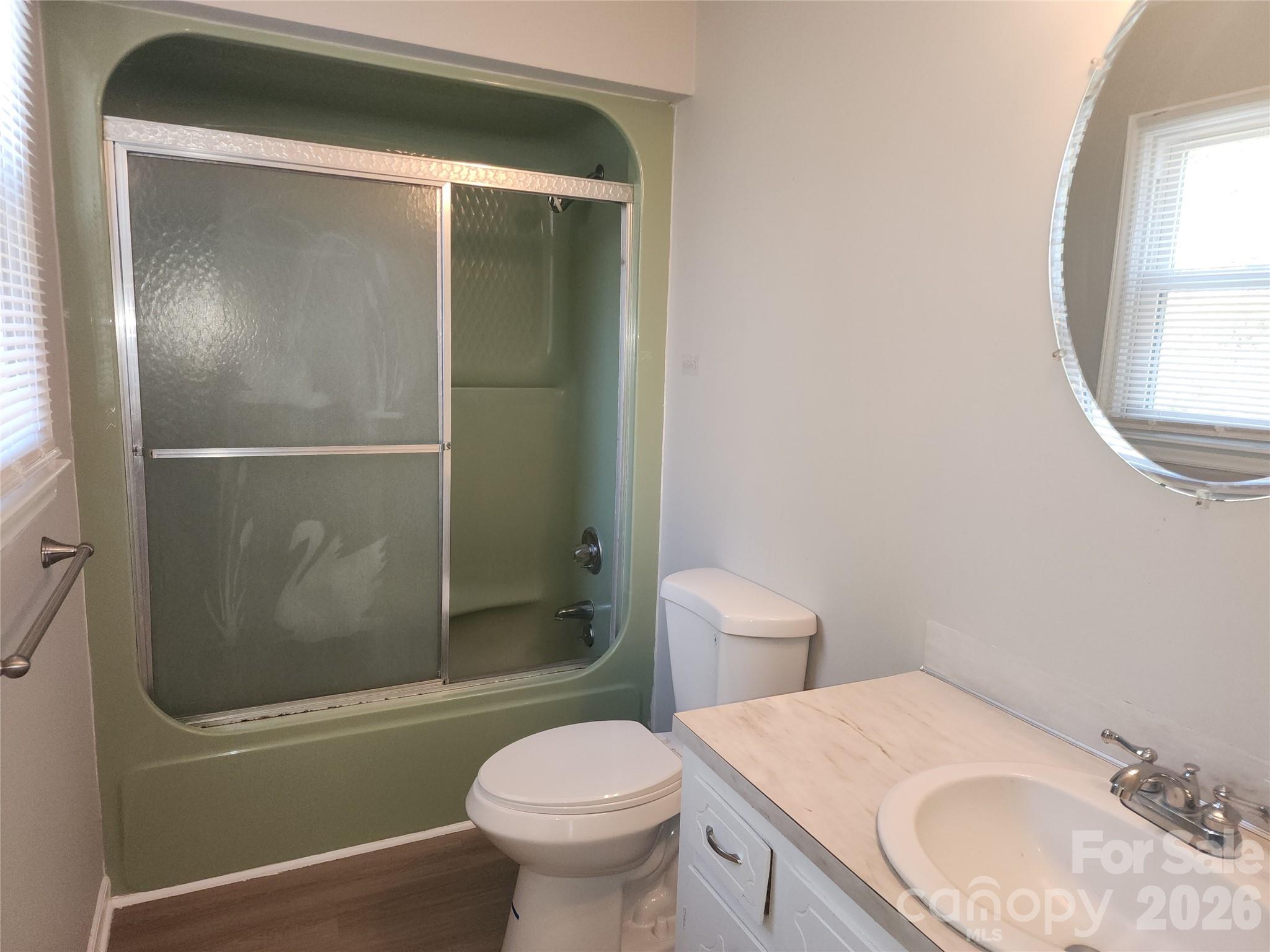 150 Autumn Leaf Road Troutman, NC 28166 - Photo 15 of 21 a bathroom with a sink toilet and shower