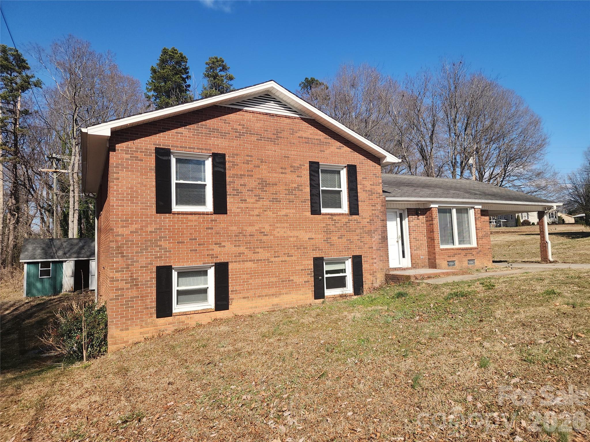 150 Autumn Leaf Road Troutman, NC 28166 - Photo 2 of 21 a front view of a house with a yard