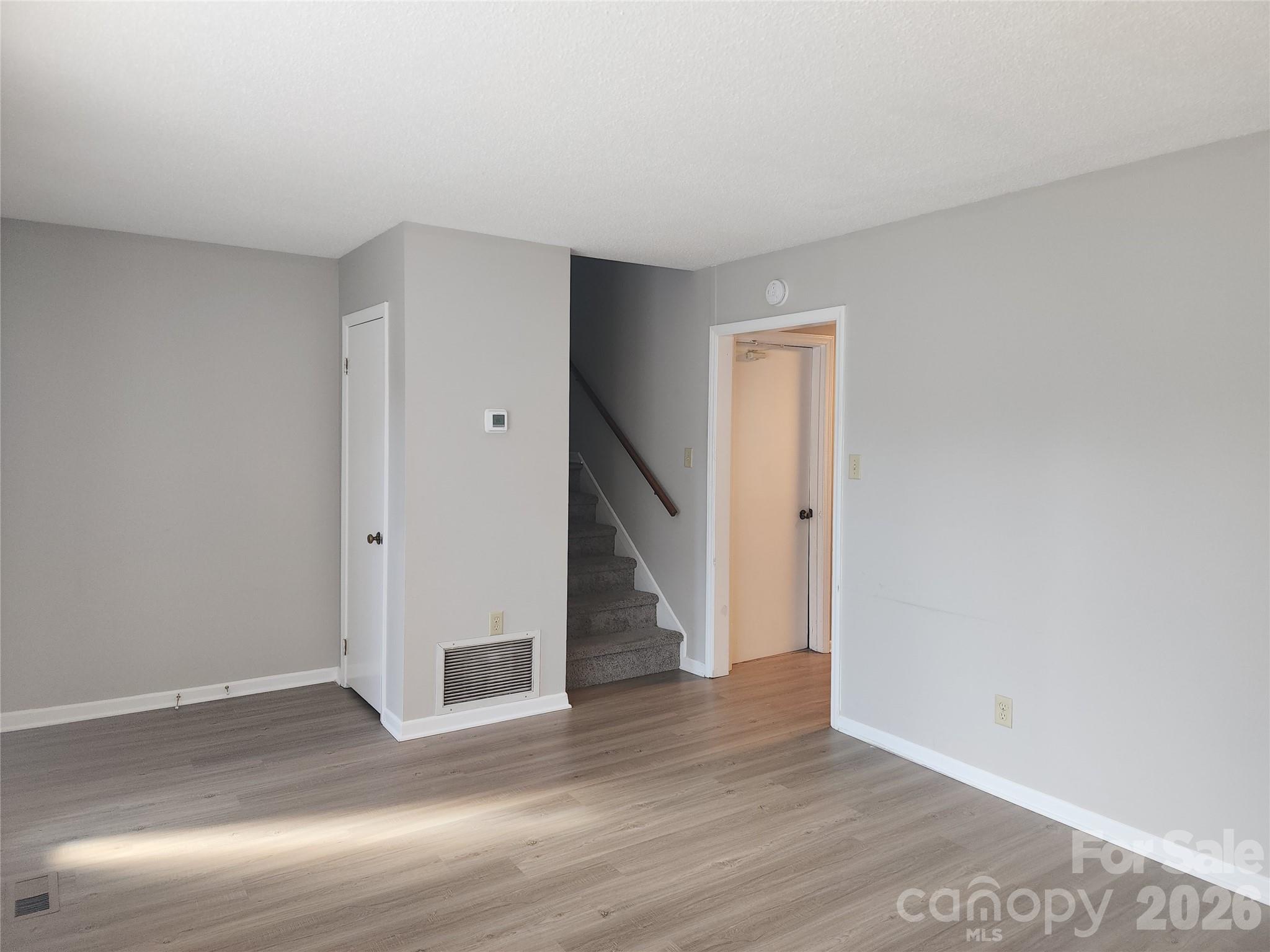 150 Autumn Leaf Road Troutman, NC 28166 - Photo 7 of 21 a view of entryway with wooden floor